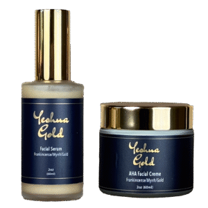 Yeshua Gold Facial Serum and AHA Facial Creme, natural organic skincare products for hydration and rejuvenation, featured in the Essentials Collection.